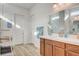 Bright bathroom vanity with modern mirror and lighting at 161 Cabo Cruces Dr, Henderson, NV 89011