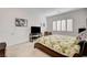 Bright bedroom featuring a comfortable bed, ample natural light, and a calming ambiance at 161 Cabo Cruces Dr, Henderson, NV 89011