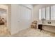 Bedroom featuring a shuttered window, desk space, and a double door closet at 161 Cabo Cruces Dr, Henderson, NV 89011