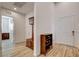 Entryway with wood flooring, coat rack, and storage at 161 Cabo Cruces Dr, Henderson, NV 89011