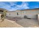 Exterior of house with gravel yard, stone pavers, and air conditioning unit at 161 Cabo Cruces Dr, Henderson, NV 89011
