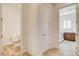 Hallway with view to bathroom and laundry room at 161 Cabo Cruces Dr, Henderson, NV 89011