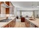 Well-equipped kitchen with stainless appliances, a large island, and an open view into the living space at 161 Cabo Cruces Dr, Henderson, NV 89011