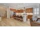 Stylish kitchen with a large island, stainless steel appliances, and open layout to the living area at 161 Cabo Cruces Dr, Henderson, NV 89011