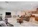 Open-concept living area connecting the kitchen and living room provides ample space for relaxation at 161 Cabo Cruces Dr, Henderson, NV 89011