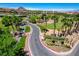 The Outlook is a lushly landscaped community near golf course, palm trees and mountain views at 161 Cabo Cruces Dr, Henderson, NV 89011