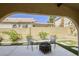 This outdoor patio with a firepit offers a cozy setting for relaxation and entertainment at 1833 Winners Cup Dr, Las Vegas, NV 89117