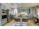 Well-equipped kitchen with stainless steel appliances and a functional kitchen island at 1833 Winners Cup Dr, Las Vegas, NV 89117