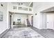 Bright living room with tall ceilings, clerestory windows, and a staircase to the upper level at 1833 Winners Cup Dr, Las Vegas, NV 89117