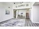 Open-concept living room with high ceilings and a staircase leading to the second floor at 1833 Winners Cup Dr, Las Vegas, NV 89117