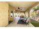 Covered patio featuring a ceiling fan, seating, and an outdoor living space at 1833 Winners Cup Dr, Las Vegas, NV 89117
