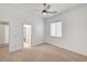 Bedroom with neutral walls and carpet, and a window at 2150 Ponticello Dr, Henderson, NV 89052
