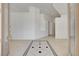 Bright foyer featuring ceramic tile flooring with a patterned design and neutral walls at 2150 Ponticello Dr, Henderson, NV 89052