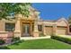 Charming home with a manicured lawn, a covered entryway, and a two-car garage at 2150 Ponticello Dr, Henderson, NV 89052