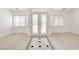 Bright living space featuring ceramic tile flooring with a patterned design and neutral walls at 2150 Ponticello Dr, Henderson, NV 89052
