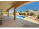 Inviting pool with spa and covered patio area perfect for outdoor living and entertaining at 2150 Ponticello Dr, Henderson, NV 89052
