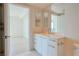 Bathroom featuring marble countertop, modern fixtures, and view into open bedroom at 222 Karen Ave # 2506, Las Vegas, NV 89109