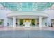 Elegant building entrance featuring valet, modern architecture, and ample seating in a refined environment at 222 Karen Ave # 2506, Las Vegas, NV 89109