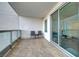 A beautiful, covered balcony with sliding doors and patio furniture at 222 Karen Ave # 601, Las Vegas, NV 89109