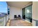 A charming balcony with patio furniture and scenic cityscape views at 222 Karen Ave # 601, Las Vegas, NV 89109