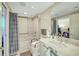 Full bathroom featuring a window, a stand-up shower, and a bathtub at 222 Karen Ave # 601, Las Vegas, NV 89109