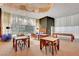 Inviting common room with ample seating, game table, and bright light from windows at 222 Karen Ave # 601, Las Vegas, NV 89109
