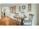 Cozy dining area features a round table, decor, and wood floors, creating an inviting space at 222 Karen Ave # 601, Las Vegas, NV 89109