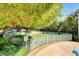 Fenced dog park area with lush landscaping for the furry residents to enjoy at 222 Karen Ave # 601, Las Vegas, NV 89109