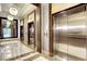 Elegant lobby featuring modern elevators, stylish lighting, and marble flooring at 222 Karen Ave # 601, Las Vegas, NV 89109