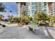 Outdoor ping pong table surrounded by landscaping, with a high-rise building in the background at 222 Karen Ave # 601, Las Vegas, NV 89109
