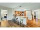 Open kitchen view showcasing a breakfast bar, stainless steel appliances, and modern cabinetry at 222 Karen Ave # 601, Las Vegas, NV 89109
