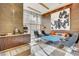 A bright seating area in the building lobby with wooden wall panels and modern decor at 222 Karen Ave # 601, Las Vegas, NV 89109