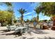 Outdoor kitchen and dining area with modern appliances perfect for entertaining Gathering and friends on a sunny day at 222 Karen Ave # 601, Las Vegas, NV 89109