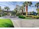 Inviting outdoor lounge with shaded seating, lush greenery, and views of the city skyline at 222 Karen Ave # 601, Las Vegas, NV 89109