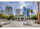 Resort-style pool area featuring sundeck, lounge chairs, and a covered bar area at 222 Karen Ave # 601, Las Vegas, NV 89109