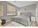 Bedroom features a queen bed, carpet flooring, and a window for natural light at 2250 Tedesca Dr, Henderson, NV 89052