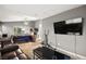 Spacious bedroom with attached living area, perfect for relaxing and entertaining at 2250 Tedesca Dr, Henderson, NV 89052