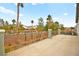 Large patio with wrought iron fencing overlooking desert landscaping at 2250 Tedesca Dr, Henderson, NV 89052