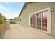 Back patio featuring multiple sliding glass doors and neighborhood view at 2250 Tedesca Dr, Henderson, NV 89052