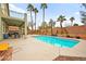 Beautiful backyard pool with mature palm trees and plenty of space to relax at 2250 Tedesca Dr, Henderson, NV 89052