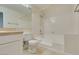 Bathroom with white tiled shower and tub at 2251 Wigwam Pkwy # 824, Henderson, NV 89074