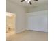 Cozy bedroom with sliding door closet and bathroom access at 2251 Wigwam Pkwy # 824, Henderson, NV 89074