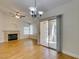 Dining area with wood floors and sliding door to the patio with lots of sunlight at 2251 Wigwam Pkwy # 824, Henderson, NV 89074