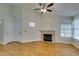 Living room with hardwood floors, fireplace, and view of entry door at 2251 Wigwam Pkwy # 824, Henderson, NV 89074