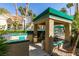 Outdoor seating area features tile detail, sink, and grill at 2251 Wigwam Pkwy # 824, Henderson, NV 89074