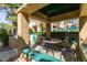 Outdoor seating area with table, chairs, and lush landscaping at 2251 Wigwam Pkwy # 824, Henderson, NV 89074