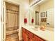 A cozy bathroom featuring a single sink vanity and shower with a tub, providing a comfortable and functional space at 2285 Moresca Ave, Henderson, NV 89052