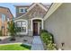 Inviting home entrance with stone accents, manicured landscaping, and stylish front door at 2285 Moresca Ave, Henderson, NV 89052