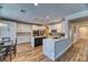 Modern kitchen with white cabinetry, stainless steel appliances, and a spacious island at 2285 Moresca Ave, Henderson, NV 89052