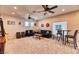 Spacious living room with fan and carpet, perfect for relaxation and entertainment at 2285 Moresca Ave, Henderson, NV 89052